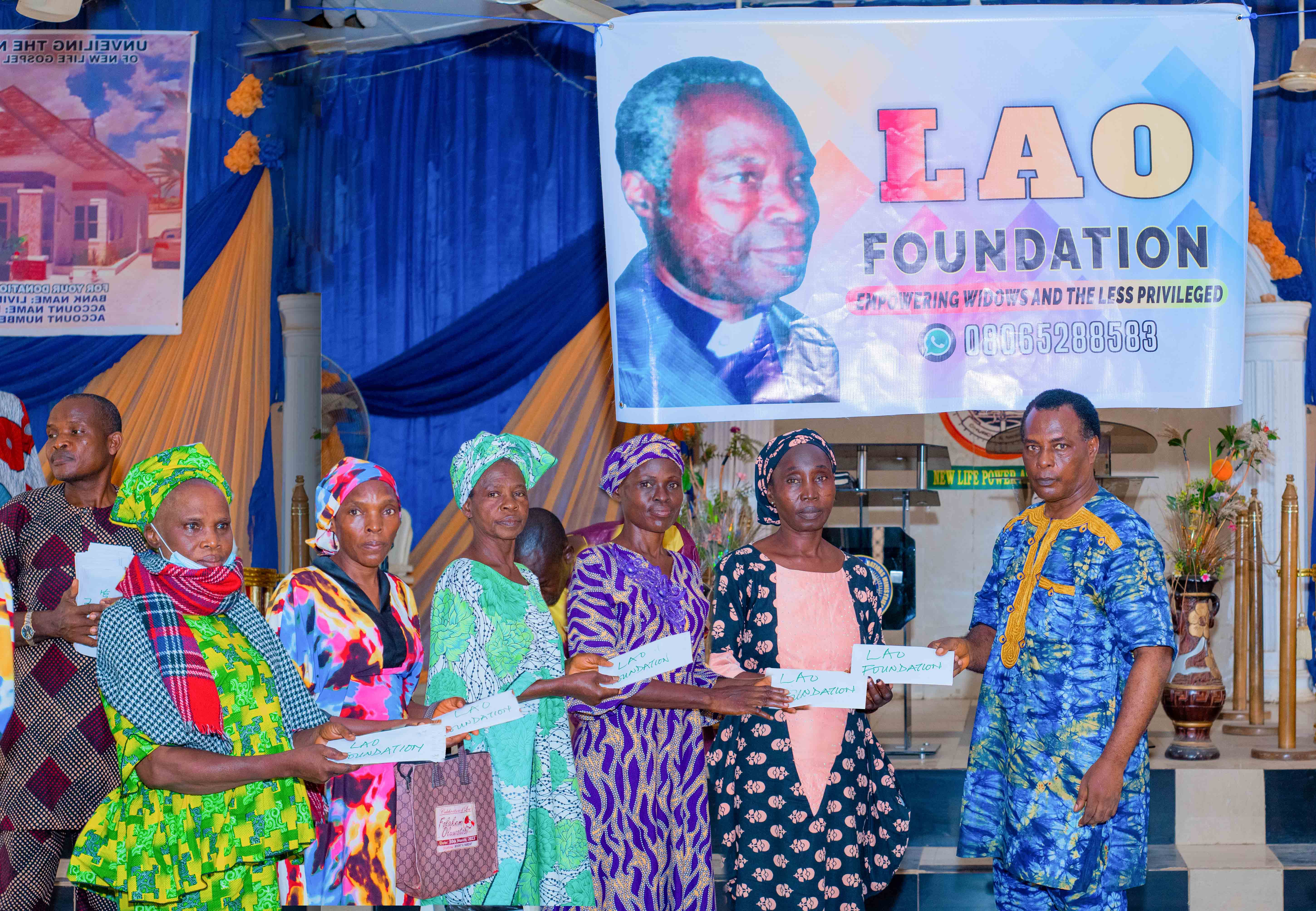 Volunteer handing aid in community